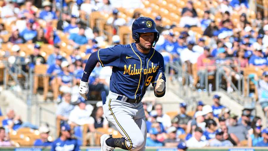 GLENDALE, ARIZONA - MARCH 24, 2023: Jackson Chourio #94 of the Milwaukee Brewers runs out a ground ball during the seventh inning of a spring training game against the Los Angeles Dodgers at Camelback Ranch on March 24, 2023 in Glendale, Arizona. (Photo by David Durochik/Diamond Images via Getty Images)