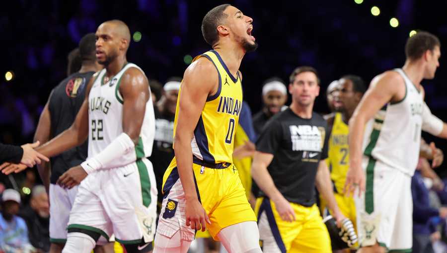 LAS VEGAS, NEVADA - DECEMBER 07: Tyrese Haliburton #0 of the Indiana Pacers reacts after hitting a 3-pointer against the Milwaukee Bucks in the second half of the East semifinal game of the inaugural NBA In-Season Tournament at T-Mobile Arena on December 07, 2023 in Las Vegas, Nevada. The Pacers defeated the Bucks 128-119. NOTE TO USER: User expressly acknowledges and agrees that, by downloading and or using this photograph, User is consenting to the terms and conditions of the Getty Images License Agreement. (Photo by Ethan Miller/Getty Images)